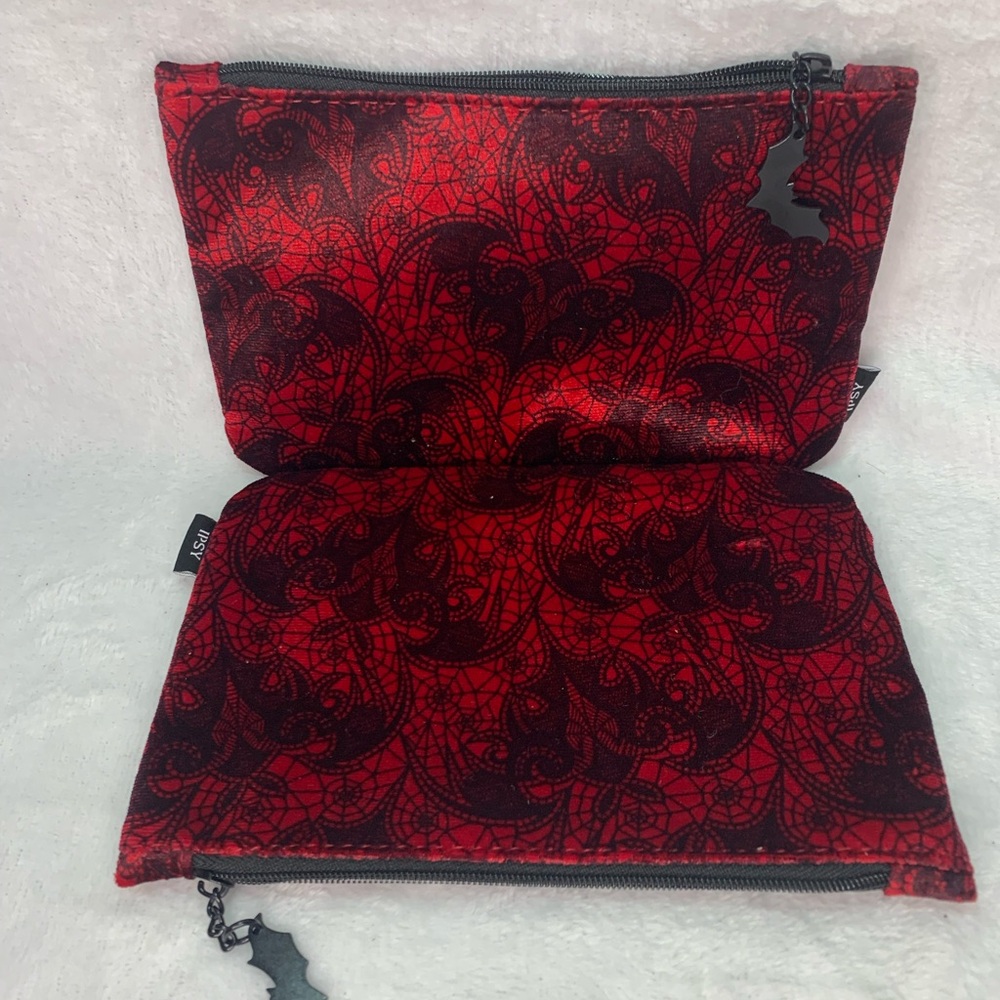Red and black paisley print makeup bag with a velvet-like feel